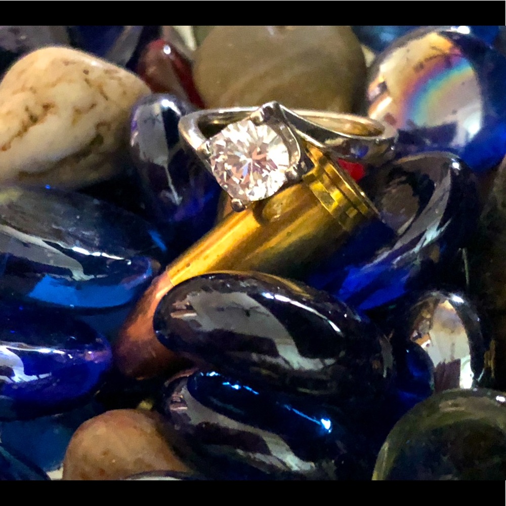 Moissanite solitaire ring